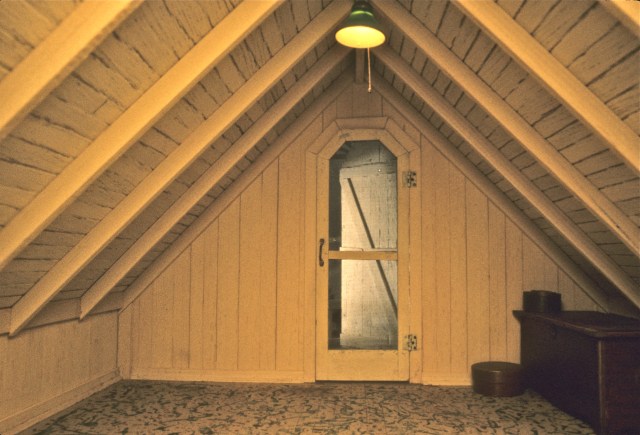 Upstairs with balcony door, beaded wood ceiling and speckle-painted fit floor