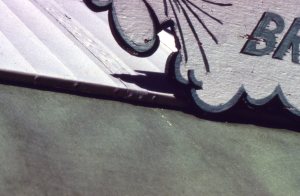 Roof detail under sign.